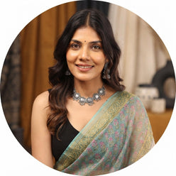 Sairee Chahal wearing a sea green Handblock Kota Doriya saree with small butti prints and a golden border.