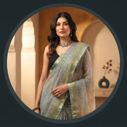 Sushmita Sen wearing a sea green Handblock Kota Doriya saree with small butti prints and a golden border.